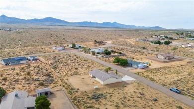 This Valle Vista home sits on nearly one-third of an acre along on Valle Vista Golf Course in Arizona - for sale on GolfHomes.com, golf home, golf lot