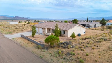 This Valle Vista home sits on nearly one-third of an acre along on Valle Vista Golf Course in Arizona - for sale on GolfHomes.com, golf home, golf lot