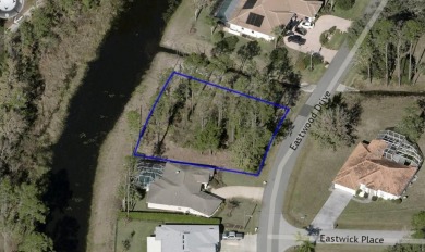 Under contract-accepting backup offers. Oversized, freshwater on The Grand Club Cypress Course in Florida - for sale on GolfHomes.com, golf home, golf lot