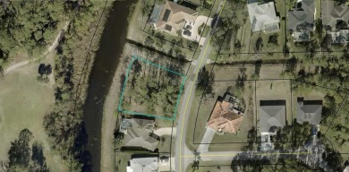 Under contract-accepting backup offers. Oversized, freshwater on The Grand Club Cypress Course in Florida - for sale on GolfHomes.com, golf home, golf lot