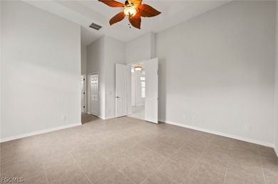 POOL Home in NW Cape Coral! A growing location, across from on Burnt Store Golf Club in Florida - for sale on GolfHomes.com, golf home, golf lot