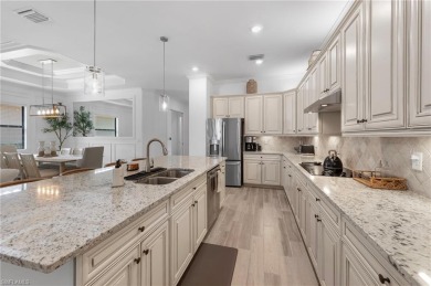This highly desirable Maria model showcases a wide eastern lake on Bonita National Golf Course in Florida - for sale on GolfHomes.com, golf home, golf lot