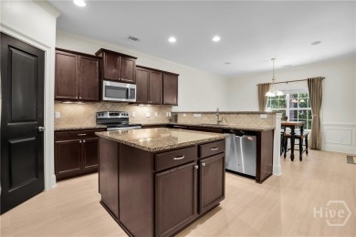 Welcome to this well-maintained townhome in the gated community on Savannah Quarters Country Club in Georgia - for sale on GolfHomes.com, golf home, golf lot