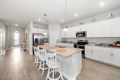 Better than new! This 4 bedroom, 3 bath waterfront front home on River Hall Country Club in Florida - for sale on GolfHomes.com, golf home, golf lot