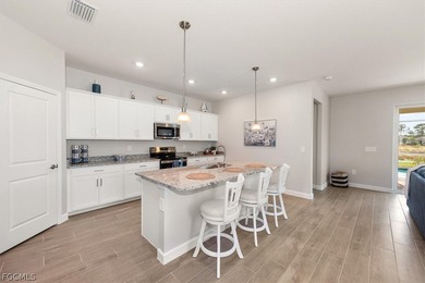 Better than new! This 4 bedroom, 3 bath waterfront front home on River Hall Country Club in Florida - for sale on GolfHomes.com, golf home, golf lot