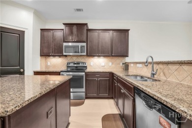 Welcome to this well-maintained townhome in the gated community on Savannah Quarters Country Club in Georgia - for sale on GolfHomes.com, golf home, golf lot