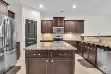 Welcome to this well-maintained townhome in the gated community on Savannah Quarters Country Club in Georgia - for sale on GolfHomes.com, golf home, golf lot