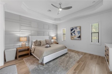 This highly desirable Maria model showcases a wide eastern lake on Bonita National Golf Course in Florida - for sale on GolfHomes.com, golf home, golf lot