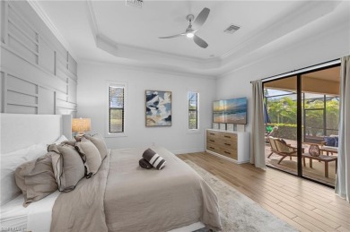 This highly desirable Maria model showcases a wide eastern lake on Bonita National Golf Course in Florida - for sale on GolfHomes.com, golf home, golf lot