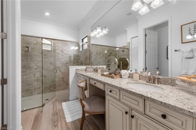 This highly desirable Maria model showcases a wide eastern lake on Bonita National Golf Course in Florida - for sale on GolfHomes.com, golf home, golf lot