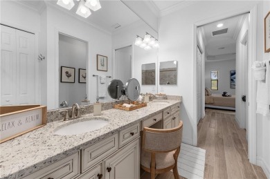 This highly desirable Maria model showcases a wide eastern lake on Bonita National Golf Course in Florida - for sale on GolfHomes.com, golf home, golf lot