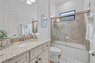 This highly desirable Maria model showcases a wide eastern lake on Bonita National Golf Course in Florida - for sale on GolfHomes.com, golf home, golf lot