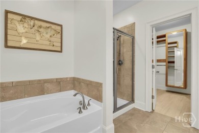 Welcome to this well-maintained townhome in the gated community on Savannah Quarters Country Club in Georgia - for sale on GolfHomes.com, golf home, golf lot