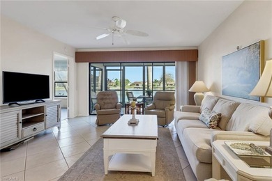 This desirable first floor condo has stunning lake views from on Riviera Golf Club in Florida - for sale on GolfHomes.com, golf home, golf lot