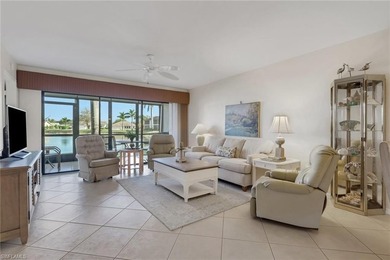 This desirable first floor condo has stunning lake views from on Riviera Golf Club in Florida - for sale on GolfHomes.com, golf home, golf lot