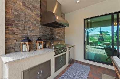 This highly desirable Maria model showcases a wide eastern lake on Bonita National Golf Course in Florida - for sale on GolfHomes.com, golf home, golf lot