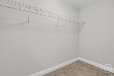 Welcome to this well-maintained townhome in the gated community on Savannah Quarters Country Club in Georgia - for sale on GolfHomes.com, golf home, golf lot