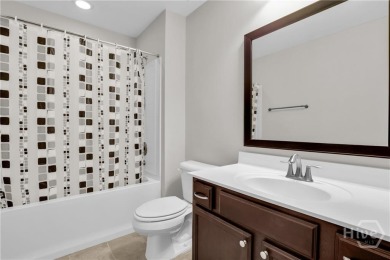 Welcome to this well-maintained townhome in the gated community on Savannah Quarters Country Club in Georgia - for sale on GolfHomes.com, golf home, golf lot