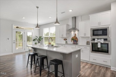 Welcome to this stunning lightly lived in, 3 bedroom home on Reedy Creek Golf Course in North Carolina - for sale on GolfHomes.com, golf home, golf lot