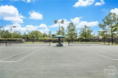 Welcome to this well-maintained townhome in the gated community on Savannah Quarters Country Club in Georgia - for sale on GolfHomes.com, golf home, golf lot