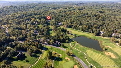 Tucked behind the tee box of Hole #3 at Old Kinderhook, this on The Club At Old Kinderhook in Missouri - for sale on GolfHomes.com, golf home, golf lot