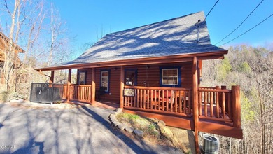Charming Mountain Cabin with Views, Hot Tub & STR Income on Bent Creek Golf Course in Tennessee - for sale on GolfHomes.com, golf home, golf lot