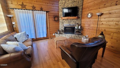 Charming Mountain Cabin with Views, Hot Tub & STR Income on Bent Creek Golf Course in Tennessee - for sale on GolfHomes.com, golf home, golf lot