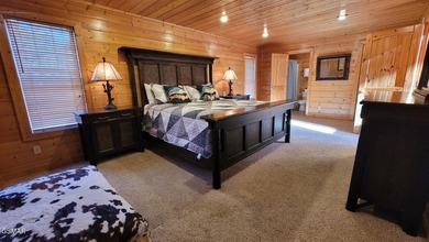 Charming Mountain Cabin with Views, Hot Tub & STR Income on Bent Creek Golf Course in Tennessee - for sale on GolfHomes.com, golf home, golf lot