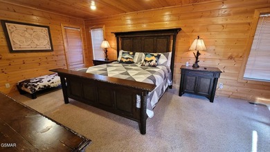 Charming Mountain Cabin with Views, Hot Tub & STR Income on Bent Creek Golf Course in Tennessee - for sale on GolfHomes.com, golf home, golf lot