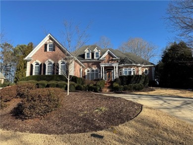 A RARE FIND! This four-sided brick RANCH-style residence with on Laurel Springs Golf Club in Georgia - for sale on GolfHomes.com, golf home, golf lot