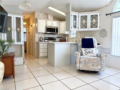 2Br/2Ba with a cozy rear lanai- located within the Imperial on The Rookery At Marco in Florida - for sale on GolfHomes.com, golf home, golf lot