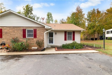 Lakefront condo with a deeded boat slip and boat for under on Stone Creek Cove Golf Course in South Carolina - for sale on GolfHomes.com, golf home, golf lot