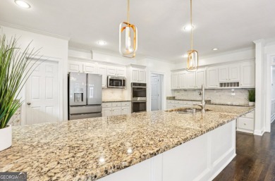 Discover an extraordinary 8,999 square foot sanctuary perfect on Brookstone Golf and Country Club in Georgia - for sale on GolfHomes.com, golf home, golf lot