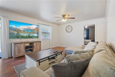 Spacious 4-bedroom, 2-bath home on 1.2 acres overlooking the on Independence Country Club in Kansas - for sale on GolfHomes.com, golf home, golf lot