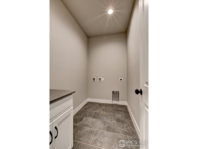 The Camden2 by Landmark Homes offers lock & leave, unparalleled on Fox Hill Country Club in Colorado - for sale on GolfHomes.com, golf home, golf lot