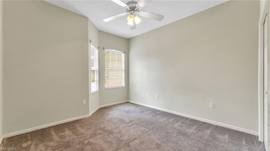 Now offered for sale, this beautifully maintained second-floor on Grasslands Golf and Country Club in Florida - for sale on GolfHomes.com, golf home, golf lot