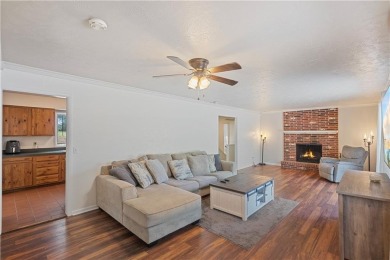 Spacious 4-bedroom, 2-bath home on 1.2 acres overlooking the on Independence Country Club in Kansas - for sale on GolfHomes.com, golf home, golf lot