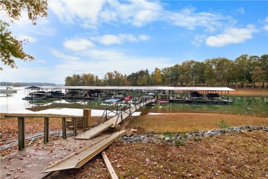 Lakefront condo with a deeded boat slip and boat for under on Stone Creek Cove Golf Course in South Carolina - for sale on GolfHomes.com, golf home, golf lot