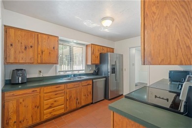 Spacious 4-bedroom, 2-bath home on 1.2 acres overlooking the on Independence Country Club in Kansas - for sale on GolfHomes.com, golf home, golf lot