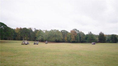 Lakefront condo with a deeded boat slip and boat for under on Stone Creek Cove Golf Course in South Carolina - for sale on GolfHomes.com, golf home, golf lot