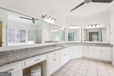 Discover an extraordinary 8,999 square foot sanctuary perfect on Brookstone Golf and Country Club in Georgia - for sale on GolfHomes.com, golf home, golf lot