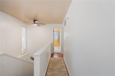 Spacious 4-bedroom, 2-bath home on 1.2 acres overlooking the on Independence Country Club in Kansas - for sale on GolfHomes.com, golf home, golf lot