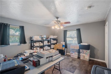 Spacious 4-bedroom, 2-bath home on 1.2 acres overlooking the on Independence Country Club in Kansas - for sale on GolfHomes.com, golf home, golf lot