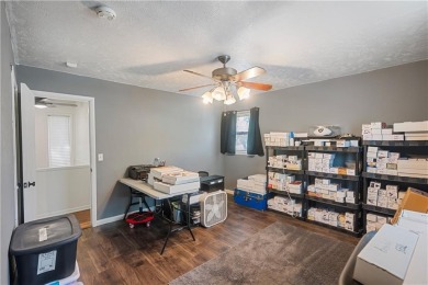 Spacious 4-bedroom, 2-bath home on 1.2 acres overlooking the on Independence Country Club in Kansas - for sale on GolfHomes.com, golf home, golf lot