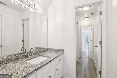 Discover an extraordinary 8,999 square foot sanctuary perfect on Brookstone Golf and Country Club in Georgia - for sale on GolfHomes.com, golf home, golf lot