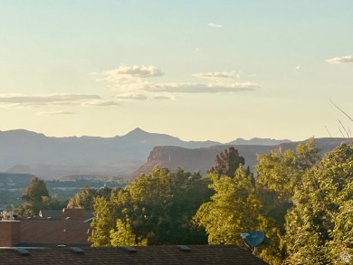 Come home to serene panoramic views of the red rock landscape on St. George Golf Course in Utah - for sale on GolfHomes.com, golf home, golf lot