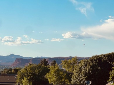 Come home to serene panoramic views of the red rock landscape on St. George Golf Course in Utah - for sale on GolfHomes.com, golf home, golf lot