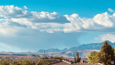 Come home to serene panoramic views of the red rock landscape on St. George Golf Course in Utah - for sale on GolfHomes.com, golf home, golf lot