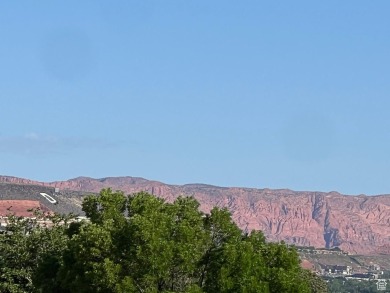 Come home to serene panoramic views of the red rock landscape on St. George Golf Course in Utah - for sale on GolfHomes.com, golf home, golf lot