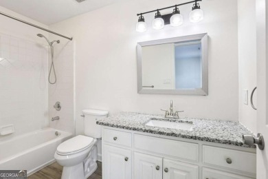 Discover an extraordinary 8,999 square foot sanctuary perfect on Brookstone Golf and Country Club in Georgia - for sale on GolfHomes.com, golf home, golf lot